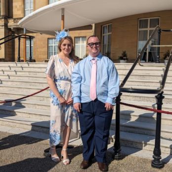 Laurie and Katie outside Buckingham Palace