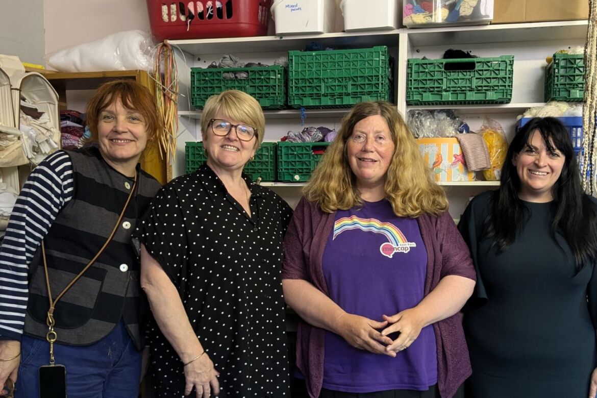 Elizabeth, Fiona, Nicola and Leonora in The ScrapStore smiling to camera