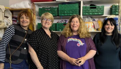 Elizabeth, Fiona, Nicola and Leonora in The ScrapStore smiling to camera