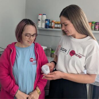 Becky shows Amy a cooking locker valve